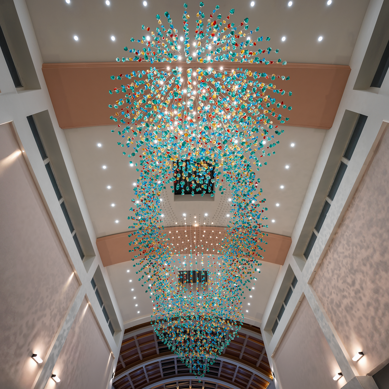 Commercial lobby with sculptural glass chandelier